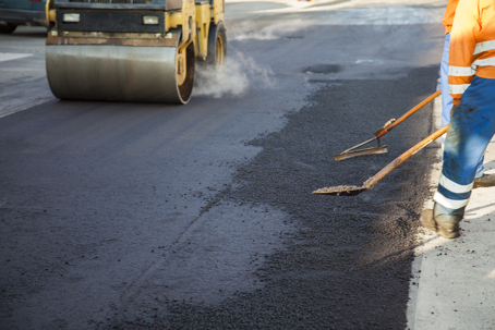 Laying new layer of asphalt